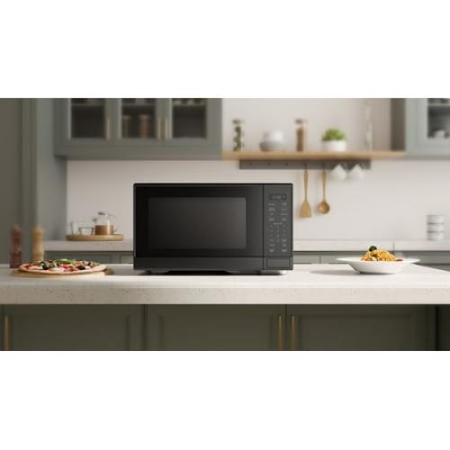 Mainstays 1.1 cu ft Microwave Oven in black