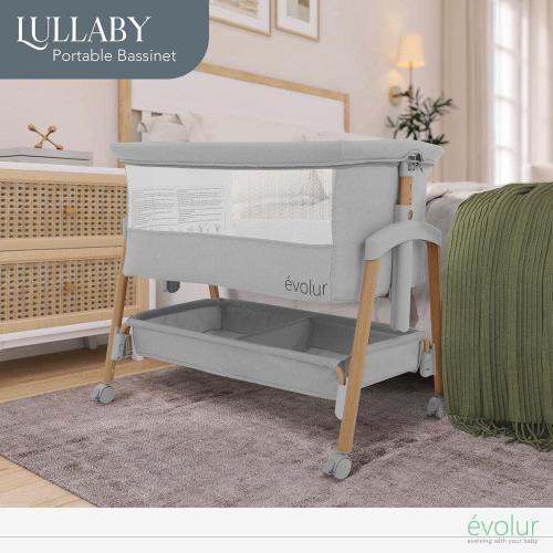 Light Gray Lullaby Portable Bassinet with wheels