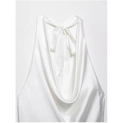 Size XS.....Women's blouse size Xs with closed neck or and back out