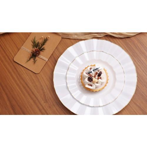 HIGH END 100 Pcs White Wave Plastic Plates with Gold Trim