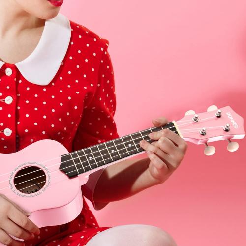 Color Pink Donner Soprano Ukulele for Beginner 21 Inch Ukelele Starter Bundle Kit with Free Online Lessons Bag Strap String Tuner Picks Cloth (Pink)…