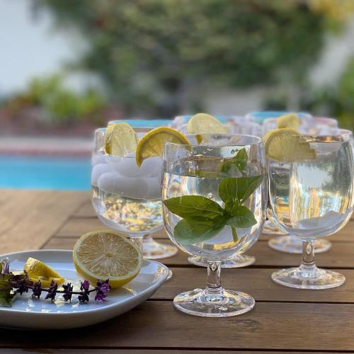 Lily's Home Set of 8 Unbreakable Poolside 12 oz Acrylic Plastic Wine and Water Tumbler Stackable Goblets. Shatterproof Plastic and Ideal for Indoor and Outdoor Use, Reusable. Clear. Made in Taiwan.
