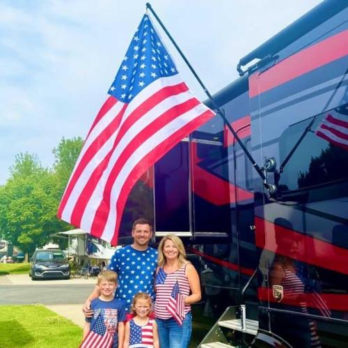 The Traveler RV Suction Cup Flag Pole Kit. Includes Double Sucion Cup Mount, 5ft Fiberglass Retractable Pole, A Beautiful 3'x5' US Flag And A Storage Bag.
