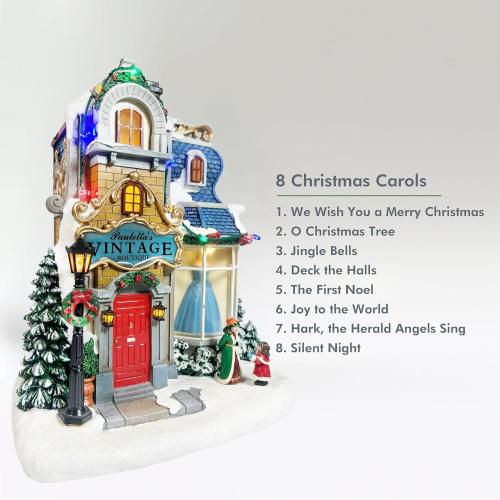 MOMENTS IN TIME Lighted Christmas Village Vintage Boutique LED 10.6” Musical Polyresin Holiday Building, Battery Operated Tabletop Christmas Decoration