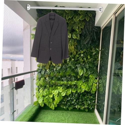 Adjustable Spring Tension Rod for Bathroom Kitchen and Wardrobe No Drill Stainless Steel Hanging Non- for Easy Installation and Versatile Use