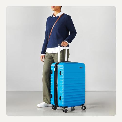 Amazon Basics 26 Hardside Medium Checked Luggage, Hardshell Suitcase With Wheels, Expandable For Up to 15% More Space, With Scratch-Resistant Surface, Four Multi-directional Wheels, Light Blue