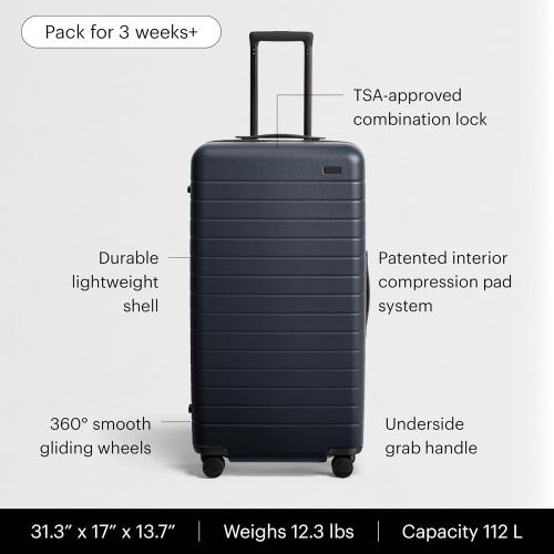 Away Trunk Checked Luggage - 31-Inch Lightweight Hardside Suitcase with 360° WhisperGlide Spinner Wheels, Interior Compression System, TSA-Accepted Lock - Navy Blue