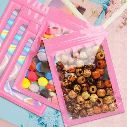 Funfery 100 pcs Pink Mylar Holographic Bags Packaging Bags,Clear Seal Resealable Smell Proof Bag Foil Pouch Bag for Food Storage and Lipgloss,Jewelry,Eyelash Packaging for Small Business(3x4.7In)