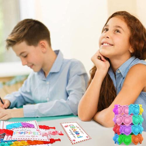 AYGXU 30pcs Valentines Day Gifts. Valentines Day Cards for Classroom & School. Heart POP Bracelets. Valentine's Classroom Exchange Cards & Kids Party Favors. Valentines Goody Bag Filler