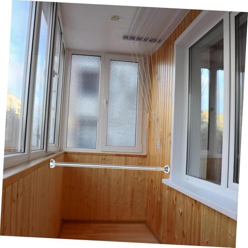 Adjustable Spring Tension Rod for Bathroom Kitchen and Wardrobe No Drill Stainless Steel Hanging Non- for Easy Installation and Versatile Use