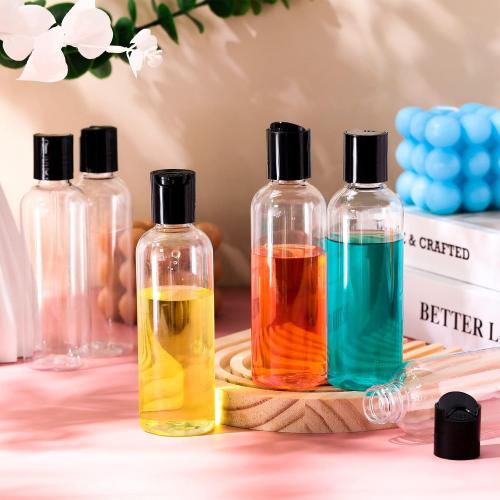 Roshtia 100 Pack 3.4 oz Travel Bottles for Toiletries, Clear Refillable Plastic Bottles with Disc Top Flip Cap, Leak Proof Empty Containers for Lotion, Shampoo, Essential Oil, Bulk Travel Size(Black)