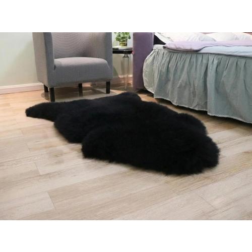 Woolous Black Sheepskin Rug, Genuine New Zealand Lambskin Wool, Real Sheep Skin Throw for Bedroom, Living Room, Sofa, or Chair (Single Pelt, 2x3 ft)