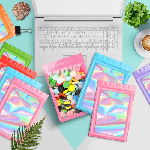 Funfery 100 pcs Pink Mylar Holographic Bags Packaging Bags,Clear Seal Resealable Smell Proof Bag Foil Pouch Bag for Food Storage and Lipgloss,Jewelry,Eyelash Packaging for Small Business(3x4.7In)
