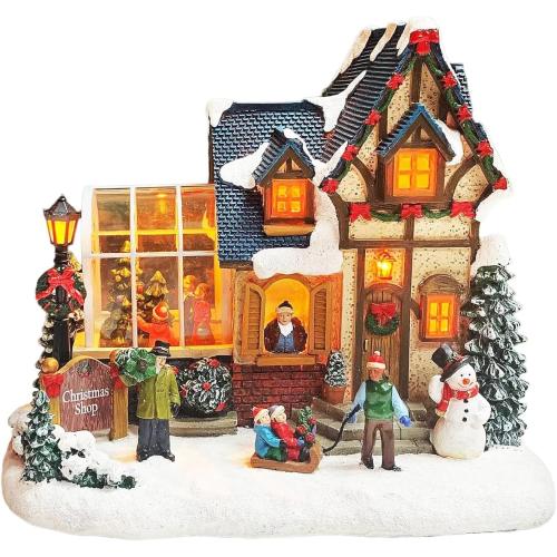 MOMENTS IN TIME Christmas Village Building Lighted Christmas Shop with LED Lights, Music & Snowman Battery Operated or Plug-in Vintage Holiday Village House Décor 8.5”H x 9.8”W x 6.9”D