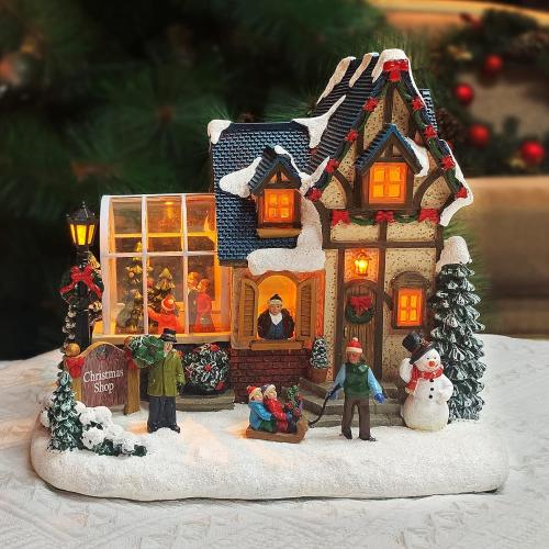 MOMENTS IN TIME Christmas Village Building Lighted Christmas Shop with LED Lights, Music & Snowman Battery Operated or Plug-in Vintage Holiday Village House Décor 8.5”H x 9.8”W x 6.9”D