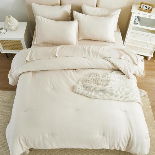 Cream-colored queen-size bed comforter