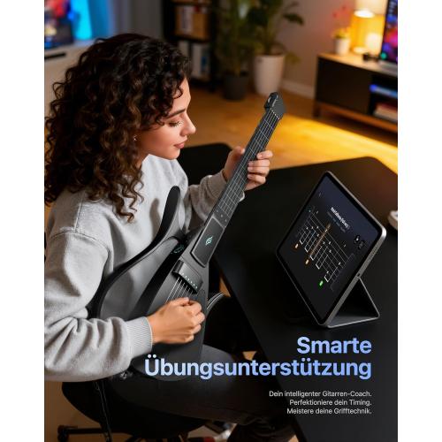 Color black Enya CYBER-G Smart Guitar With Silicone Strings, 24 Built-in Tones, Travel Silent Guitar with Speaker and Drum system,App Interactive Chord Sheets For Adults & Teens