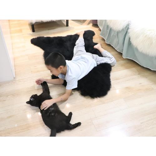 Woolous Black Sheepskin Rug, Genuine New Zealand Lambskin Wool, Real Sheep Skin Throw for Bedroom, Living Room, Sofa, or Chair (Single Pelt, 2x3 ft)