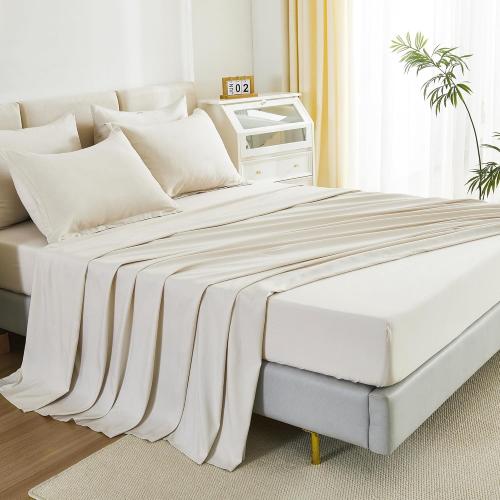 Cream-colored queen-size bed comforter