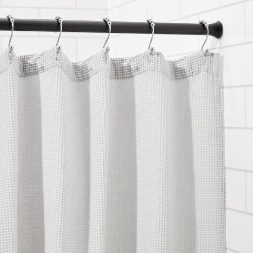 Amazon Basics Adjustable Sturdy Spring Tension Curtain Rod, No Drilling/No Holes, 36-54, Black, Classic Finial