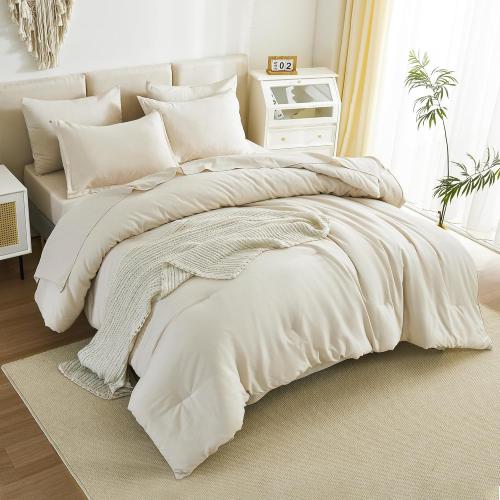 Cream-colored queen-size bed comforter