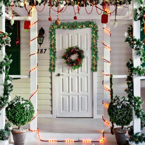 Joiedomi 9FT Christmas Garland Prelit with 50 Count String Lights, Bristle, Pine Cones, Holly Berries for Outdoor & Indoor Winter Christmas and Holidays Decorations, Plug in Lighted Pine Garland