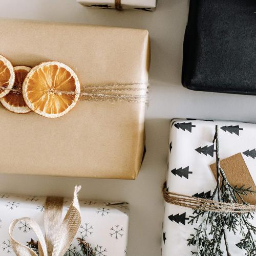 Holiday Kraft Wrapping Paper Set (4 Rolls, 120 sq. ft. total) Black, White, Brown, Christmas Trees, Snowflakes with Cutting Grid Lines on Back