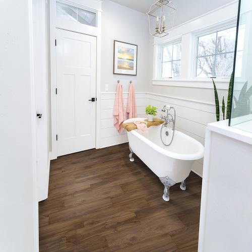 STAINMASTER Fletcher Oak Brown 22-mil x 9-in W x 47-in L Waterproof Interlocking Luxury Vinyl Plank Flooring (18.78-sq ft/ Carton)