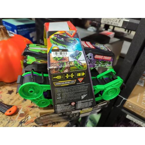 Monster Jam, Official Grave Digger Trax All-Terrain Remote Control Outdoor Vehicle, 1:15 Scale, Kids Toys for Boys and Girls Ages 4 and Up