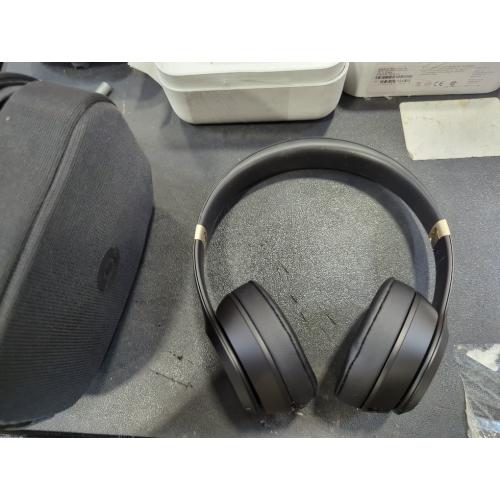 Black and Gold Beats Solo 4 - Wireless Bluetooth On-Ear Headphones, Apple & Android Compatible, Up to 50 Hours of Battery Life - Black & Gold - Black