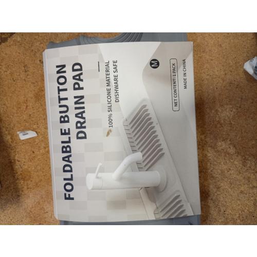 Foldable button drain pad