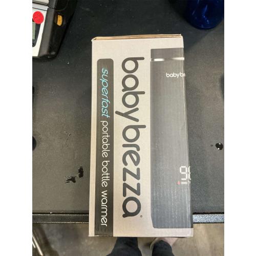 Baby Brezza Portable Warmer – used 67% Faster Baby Bottle Warming - Travel Breastmilk and Formula Warmer - Safe, Even Heating - Up to 9oz - No Adapters, Black