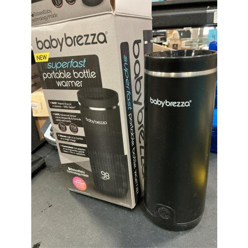 Baby Brezza Portable Warmer – used 67% Faster Baby Bottle Warming - Travel Breastmilk and Formula Warmer - Safe, Even Heating - Up to 9oz - No Adapters, Black