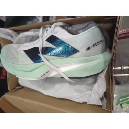 Size 9 Color Green New Balance Women's FuelCell Rebel V4 Running Shoe