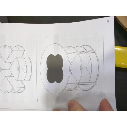 Size Large Color White round table with black flower print on top