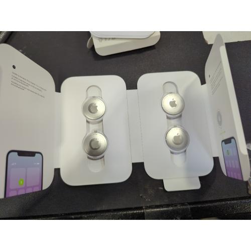 White Apple AirTag 4 Pack. Keep Track of and find Your Keys, Wallet, Luggage, Backpack, and More. Simple one-tap Set up with iPhone or iPad