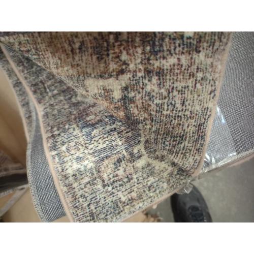 Size medium Color beige area rug