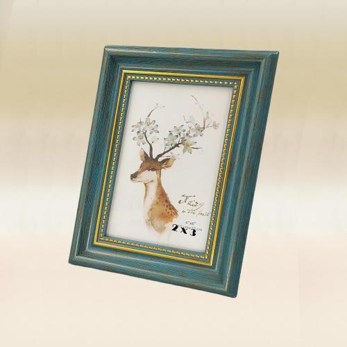 2x3 Blue Picture Frame.Table and Wall.Transparent Acrylic Panel